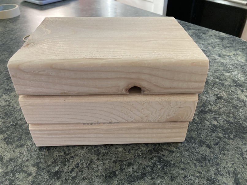 3 short 2x6s stacked on table