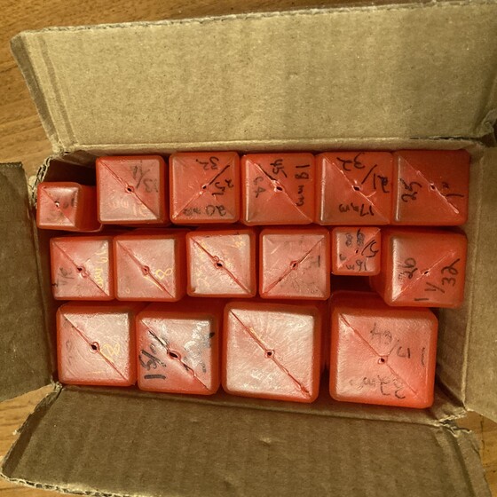 red boxes in a box. no order to the size
